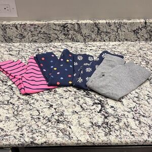 Primary Leggings: 4 Total: Stripes, polka dots, flowers, and gray